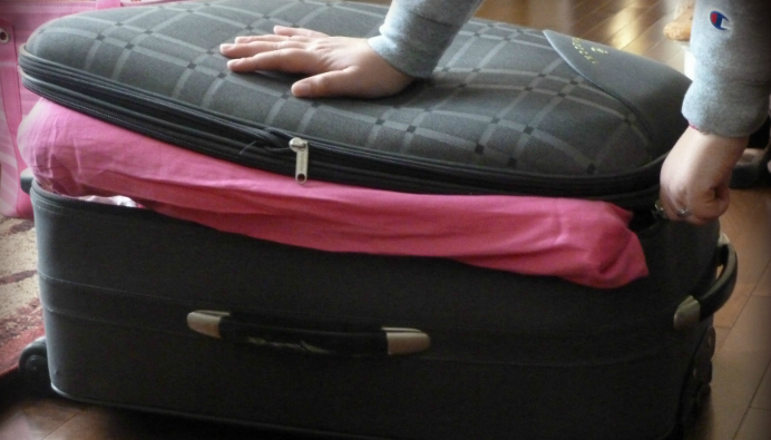 The Overfilled Suitcase
